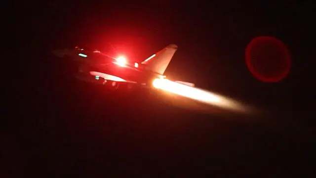epa11070759 A handout photo made available by the British Royal Air Force (RAF) shows a RAF Typhoon aircraft taking off to join a US-led coalition to conduct air strikes against military targets in Yemen, from RAF Akrotiri base in Cyprus, 11 January 2024 (issued 12 January 2024). Four RAF Typhoons launched from RAF Akrotiri on 11 January to conduct strikes against military targets in Yemen. Houthi rebels have been targeting merchant vessels in the Red Sea and Gulf of Aden with missiles and drones. According to the Royal Air Force, Houthi attacks in the Red Sea greatly increased between November and December, causing major shipping companies to cease sailing in the region and insurance costs to rise ten-fold since early December. EPA/SGT LEE GODDARD/BRITISH ROYAL AIR FORCE MANDATORY CREDIT: UK MOD CROWN COPYRIGHT HANDOUT EDITORIAL USE ONLY/NO SALES HANDOUT EDITORIAL USE ONLY/NO SALES