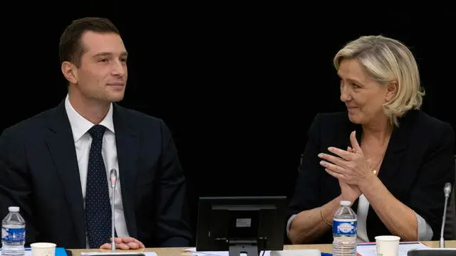 epa11606052 French far right party Rassemblement National (RN) leader Jordan Bardella (L) and Marine Le Pen attend the Expanded National Council of the Party, in Paris, France, 15 September 2024. Party President Jordan Bardella focused in his speech on the role of the Rassemblement National with its newly elected deputies will play regarding the policy of the new government that will be formed by the New designed French Prime Minister Michel Barnier. EPA/ANDRE PAIN