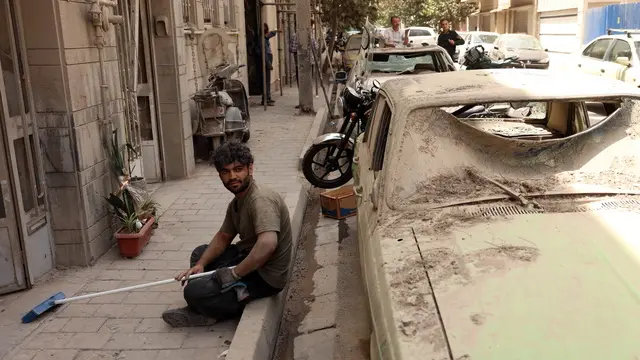 epa12198866 An Iranian man rests as he removes debris from his damaged house after a recent Israeli airstrike, in Tehran, Iran, 26 June 2025, during a US-mediated ceasefire between Iran and Israel that started on 24 June. Israel has been conducting a campaign across Iran since 13 June, targeting nuclear, military, and energy facilities, prompting Iran to launch retaliatory waves of missiles and drones toward Israel. EPA/ABEDIN TAHERKENAREH