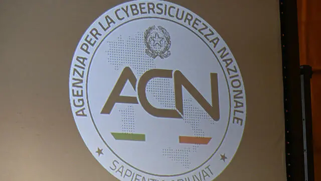 Lo stemma ACN (agenzia per la cybersicurezza nazionale), durante il convegno Cset conference 2024, cybersecurety for energy & transport infrastructures, alla sala della Grida dell'ex palazzo della Borsa. Genova, 12 novembre 2024. ANSA/LUCA ZENNARO