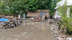 epa11508475 Rescue workers attend the scene after 11 members of a family died in a rain-related incident in Darra Adam Khel, Kohat District, Pakistan, 30 July 2024. According to the Pakistan's emergency service Rescue 1122, eleven members of a family, including women and children, drowned after their house's basement was flooded with rainwater during a heavy downpour in Darra Adam Khel. The victims were trapped while sleeping as the water rose rapidly. This incident happened amid heavy rains that have alleviated a prolonged drought in the Khyber District of Khyber Pakhtunkhwa province, bringing significant rainfall to areas like Khyber Bara, Jamrud, Landi Kotal, and Tirah Valley, and resulting in cooler temperatures in the region. EPA/BASIT GALANI