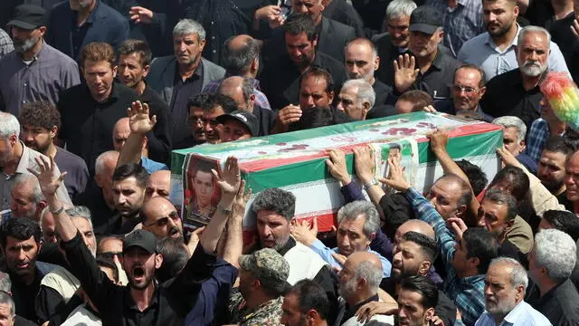 epa12198129 Iranians carry the coffin of Iranian soldier Mahan Setareh, who was killed in a recent Israeli airstrike, in the capital city of Tehran, Iran, 26 June 2025. Israel and Iran have been exchanged fire since Israel launched strikes across Iran on 13 June 2025 as part of Operation 'Rising Lion.' EPA/ABEDIN TAHERKENAREH