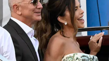 Amazon founder Jeff Bezos (L) and his fiancee Lauren Sanchez leave the Aman Hotel to attend a party, Venice, Italy, 26 June 2025, one day before their wedding celebrations are to begin. The US tech billionaire and TV presenter have reportedly invited about 200 guests to their nuptials in the Italian city.ANSA/DANIEL DAL ZENNARO