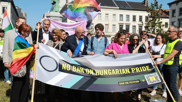 epa12196219 Members of the European Parliament, including French MEP Raphael Glucksmann, Luxembourger Marc Angel, and Spanish leader of the Progressive Alliance of Socialists and Democrats (S&D), Iratxe Garcia Perez, pose with Amnesty International activists during a ‘Mini Pride’ demonstration against Hungary’s Pride ban in front of the European Parliament and the Hungarian representation in Brussels, Belgium, 25 June 2025. Over 14,000 people in Belgium and 75,000 worldwide have signed Amnesty International's petition calling on Hungarian authorities to allow Budapest Pride to take place without fear or violence. The 30th edition, scheduled for 28 June, is at risk of being banned under a new law passed in March that allows authorities to prohibit the march, fine participants, prosecute organizers, and use facial recognition to identify attendees. EPA/OLIVIER HOSLET