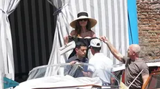 epa12202866 Amazon founder Jeff Bezos (R) and his wife Lauren Sanchez leave the Aman Hotel to have lunch at Harry's Bar the day after their wedding in Venice, Italy, 28 June 2025. EPA/ANDREA MEROLA