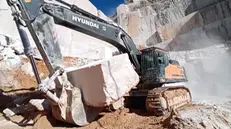 Al lavoro in una cava