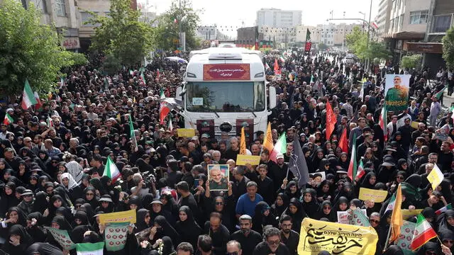 epa12202179 Iranians attend a funeral ceremony for Iranian IRGC generals and scientists who were killed in recent Israeli airstrikes, in Tehran, Iran, 28 June 2025. Israel has been conducting a campaign across Iran since 13 June, targeting nuclear, military, and energy facilities, prompting Iran to launch retaliatory waves of missiles and drones toward Israel. EPA/ABEDIN TAHERKENAREH