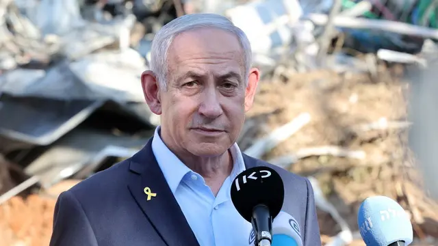 epa12187738 Israel's Prime Minister Benjamin Netanyahu delivers a statement as he visits the site of the Weizmann Institute of Science, which was hit by Iranian missiles in the central city of Rehovot, Israel, 20 June 2025. Iran and Israel have been exchanging fire since Israel carried out missile strikes on Iran on 13 June 2025. EPA/JACK GUEZ / POOL