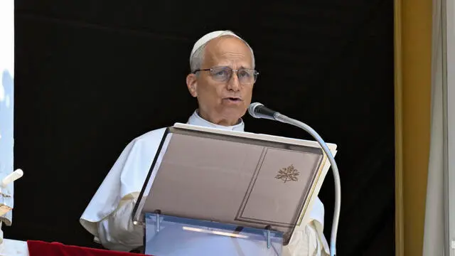 Pope Leo XIV addresses the crowd from the window of the apostolic palace overlooking St. Peter's square during the Angelus prayer in The Vatican on June 29, 2025. ASNA/US VATICAN MEDIA +++ NPK +++ NO SALES, EDITORIAL USE ONLY +++