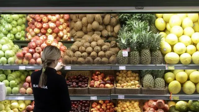 epa04544128 An employee changes the price tags to euros at a supermarket in Vilnius, Lithuania, 01 January 2015. Lithuania became the 19th country to join the eurozone, 15 years after Europe first introduced the single currency. Lithuania is the last Baltic country to adopt the euro, after Estonia did so in 2011 and Latvia followed suit in January 2014. Officials have argued that the move will also help bolster national security. Lithuania and its eastern European neighbours have said they feel threatened by Russia's actions in Ukraine. Russia is Lithuania's largest trading partner. EPA/VALDA KALNINA