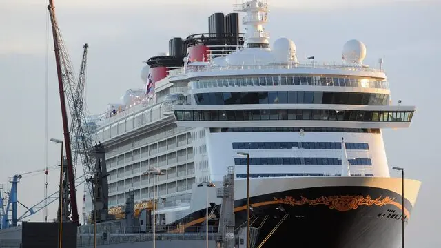 epa02487439 Cruise liner 'Disney Dream', the biggest cruise liner yet built in Germany, is docked in Bremerhaven, Germany, 09 December 2010. Before delivered to Disney Cruise Line, the 'Disney Dream' gets the last touches in Bremerhaven where its crew also will be trained. EPA/INGO WAGNER