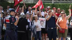 epa12178476 Supporters of jailed and suspended Istanbul Mayor Ekrem Imamoglu shout slogans and hold poasters while gathering outside the courtroom of the Silivri Prison Complex, outside Istanbul, Turkey, 16 June 2025. Imamoglu, who is held at the Silivri prison on corruption charges following his detention on 19 March 2025, is being tried in a separate case for alleged threats against Istanbul's chief prosecutor Akin Gurlek. EPA/ERDEM SAHIN