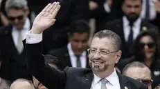 epa12076403 The President of Costa Rica, Rodrigo Chaves, greets his supporters outside the Congress in San Jose, Costa Rica, 05 May 2025. Chaves highlighted the economic results of his government after three years in Congress and launched criticism at the Judiciary and the Legislature while advocating for changes in the country's institutional system. EPA/Jeffrey Arguedas
