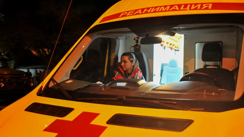 epa10249764 A resuscitation ambulance at the crash site of the Russian Su 34 bomber in Yeysk, Krasnodar Krai, Russia, 18 October 2022. The Ministry of Defense of the Russian Federation reported that the Su-34 bomber crashed in Yeysk (Krasnodar Territory), the pilots ejected. The fuel of the aircraft ignited at the site of the crash in the courtyard of a residential area. The operational headquarters of the Krasnodar Krai announced an increase in the number of deaths as a result of a fire in a nine-story building in Yeysk, on which a Su-34 bomber crashed, to 25. EPA/ARKADY BUDNITSKY