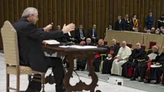 epa05175382 A handout image released by L'Osservatore Romano of Slovenian artist Marko Ivan Rupnik during his meditation in Paul VI Hall, in the occasion of the day of the Jubilee of Mercy for the Roman Curia, Vatican City, 22 February 2016. Pope Francis walked through the Holy Door at St. Peter's Basilica together with employees of the Roman Curia, as he celebrated the Feast of the Chair of Peter and the Jubilee of Mercy for the Roman Curia, the Vatican's central administrative body. EPA/OSSERVATORE ROMANO / HANDOUT