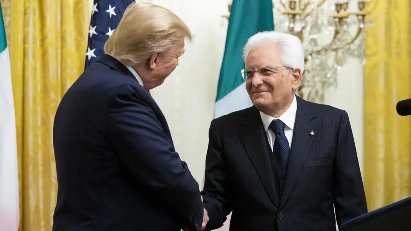 epa07926283 US President Donald J. Trump (L) shakes hands with the President of Italy Sergio Mattarella (R) at a reception in the East Room of the White House in Washington, DC, USA, 16 October 2019. US President Donald J. Trump hosted the President of Italy Sergio Mattarella and his daughter and Italy's First Lady Laura Mattarella at a reception held in honor of the Italian Republic. EPA/MICHAEL REYNOLDS