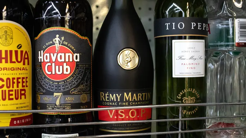 epa11654100 Alcohol for sale displayed in Beijing, China, 11 October 2024. China's Ministry of Commerce announced on 08 October that it will impose temporary anti-dumping measures on imports of brandy from the European Union. Among major producers, brands such as Remy Martin, Hennessy and Martell will be required to pay a deposit. EPA/JESSICA LEE