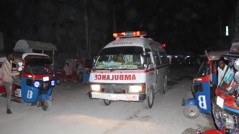 epa10682365 Emergency services on the scene as Somalia's security forces conduct an operation to neutralise fighters belonging to al Shabaab who attacked a hotel in the capital Mogadishu, Somalia, 09 June 2023, the state news agency said, while the group claimed responsibility for the attack. Attackers stormed a restaurant in the Somali capital Mogadishu using explosives and guns, wounding at least seven people, a witness and the capital's ambulance services said. EPA/Said Yusuf Wasame