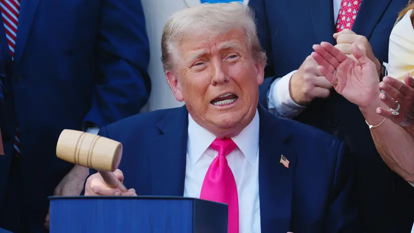 epa12216678 US President Donald Trump holds a gavel after signing a new tax and immigration bill during a ceremony at the White House in Washington, DC, USA 04 July 2025. The Independence Day festivities include President Trump signing his 'Big Beautiful Bill' into law, military flyovers, the White House Military Family Picnic and the annual fireworks display on the National Mall. EPA/BONNIE CASH / POOL POOL PHOTO