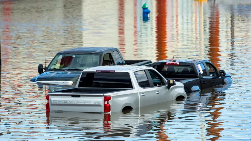 epa11467564 Vehicles trapped in flood waters following heavy rain from Hurricane Beryl in Houston, Texas, USA, 08 July 2024. The storm, which already caused widespread damage last week in the Caribbean, was downgraded to a tropical storm as it passed over the Gulf of Mexico before regaining strength into a hurricane. EPA/CARLOS RAMIREZ