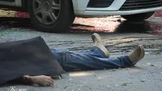 epa12152110 A handout photo released by the press service of the State Emergency Service (SES) of Ukraine shows a partially covered body at the site of a Russian strike in downtown Sumy, northeastern Ukraine, 03 June 2025, amid the Russian invasion. At least three were killed and 16 others injured after Russian shelling hit downtown Sumy, according to the State Emergency Service of Ukraine. EPA/STATE EMERGENCY SERVICE OF UKRAINE HANDOUT -- BEST QUALITY AVAILABLE -- MANDATORY CREDIT: STATE EMERGENCY SERVICE OF UKRAINE -- HANDOUT EDITORIAL USE ONLY/NO SALES