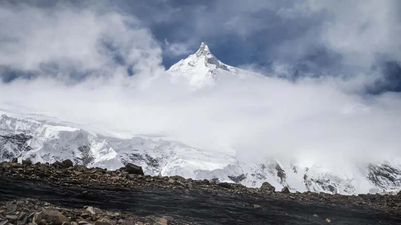 epa07846691 The summit of the Manaslu is seen from the Manaslu Base Camp at around 4,900 meters above the sea level, in Nepal, 13 September 2019 where Hungarian climber Ferenc Lengyel (not in picture) acclimatizes while preparing to conquer the peak of the Manaslu Mountain. Lengyel plans to climb the eighth highest mountain in the world at 8,163 metres above sea level in the Nepalese Himalayas without using supplement oxygen or a professional mountaineer guide. EPA/MARTON MONUS HUNGARY OUT