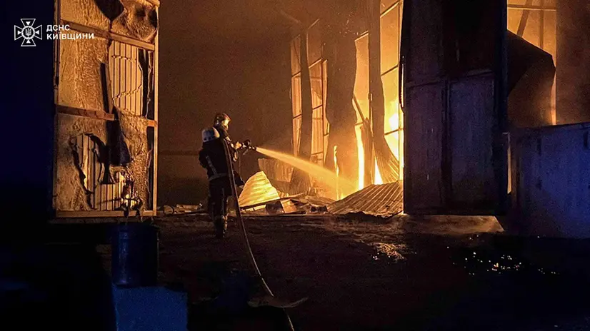epa12219549 A handout photo made available by the State Emergency Service shows Ukrainian rescuers working at the site of a shelling following Russian drone attacks in the Kyiv area, Ukraine, 06 July 2025. At least two people died and a dozen more were injured after Russian forces launched an overnight attack across Ukraine with at least 150 drones, according to the National Police. EPA/STATE EMERGENCY SERVICE HANDOUT HANDOUT EDITORIAL USE ONLY/NO SALES