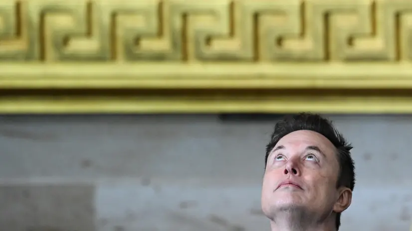epa11838642 Tesla and SpaceX CEO Elon Musk looks upward as he sits in his seat during the inauguration ceremony before Donald Trump is sworn in as the 47th US President in the US Capitol Rotunda in Washington, DC, USA, 20 January 2025. EPA/SAUL LOEB / POOL