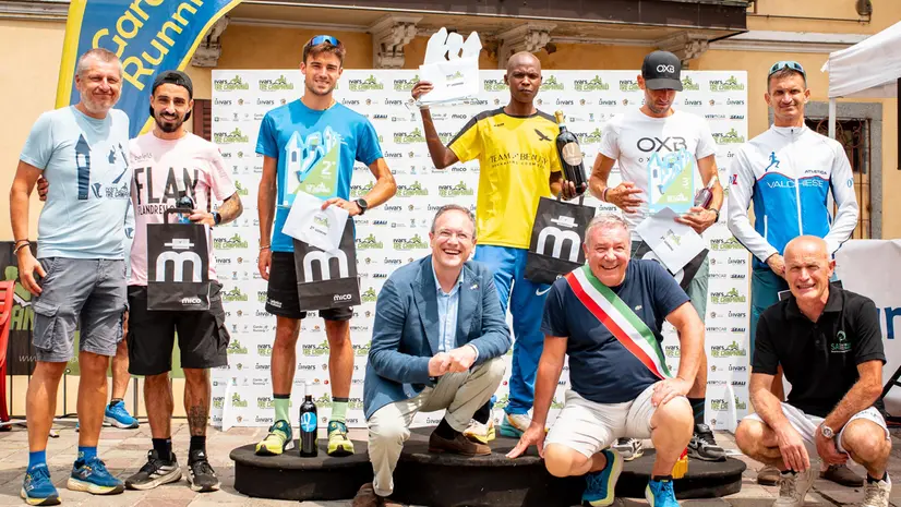 Il podio maschile: insieme a Serem Benjamin Kiprop ci sono Davide Bottarelli e Marco Biondi © www.giornaledibrescia.it