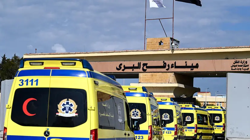 epaselect epa11888002 Ambulances drive on the Egyptian side of the Rafah border crossing between Egypt and the Gaza Strip, in Rafah, Egypt, 11 February 2025. The first phase of a six-week ceasefire deal between Israel and Hamas came into effect on 19 January 2025. Under the ceasefire deal, a number of patients and wounded people are allowed to be evacuated from the Gaza Strip. EPA/MOHAMED HOSSAM