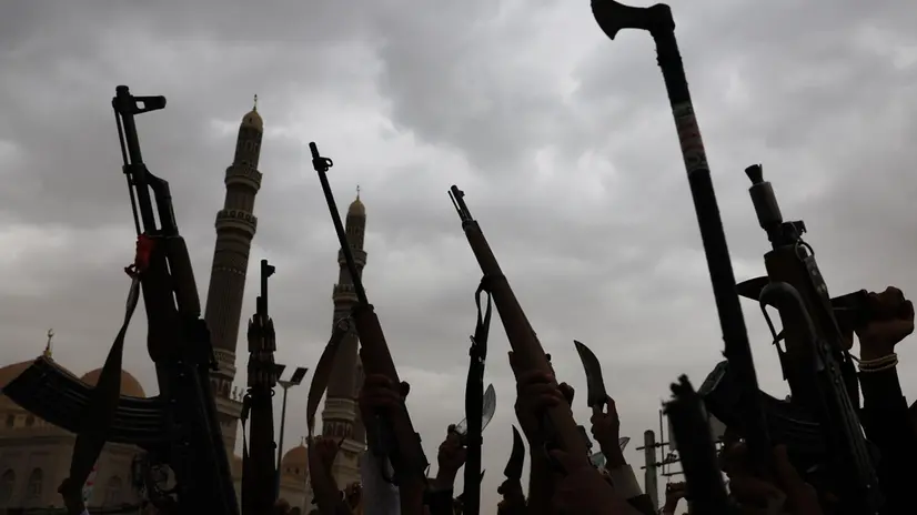 epa12215902 Houthi supporters hold up weapons during a protest against Israel, in Sana'a, Yemen, 04 July 2025. Thousands of Houthi supporters demonstrated in Sana'a against Israel's ongoing military campaign in the Gaza Strip. Houthi leader Abdul-Malik al-Houthi has claimed that his forces had fired 10 missiles and drones at Israeli targets in the past week, as part of their support for the Palestinian people in Gaza. EPA/YAHYA ARHAB