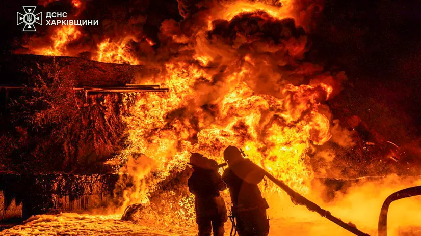 epa12217115 A handout photo made available by the State Emergency Service shows Ukrainian rescuers working to put out a fire at the site of a Russian drone attack in the city of Chuhuiv, in the Kharkiv area, Ukraine, 05 July 2025. More than 10 people were injured, including two children, in the attack carried out with at over 300 drones across Ukraine, according to the State Emergency Service. EPA/STATE EMERGENCY SERVICE HANDOUT HANDOUT EDITORIAL USE ONLY/NO SALES