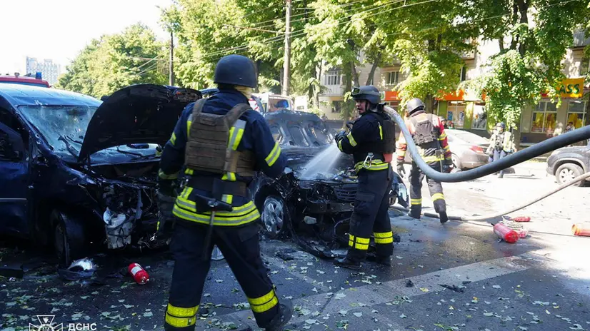 epa12152107 A handout photo released by the press service of the State Emergency Service (SES) of Ukraine shows Ukrainian rescuers working at the site of a Russian strike in downtown Sumy, northeastern Ukraine, 03 June 2025, amid the Russian invasion. At least three were killed and 16 others injured after Russian shelling hit downtown Sumy, according to the State Emergency Service of Ukraine. EPA/STATE EMERGENCY SERVICE OF UKRAINE HANDOUT -- BEST QUALITY AVAILABLE -- MANDATORY CREDIT: STATE EMERGENCY SERVICE OF UKRAINE -- HANDOUT EDITORIAL USE ONLY/NO SALES