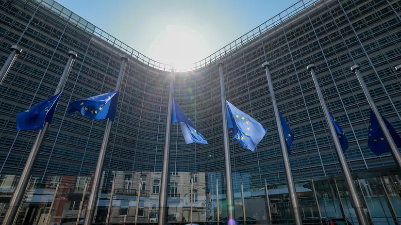 epa12169657 EU flags fly at half-mast to pay tribute to the victims of a school shooting incident in Austria, in Brussels, Belgium, 11 June 2025. At least 10 people died as a result of a school shooting in Graz, Austria, on 10 June, while the shooter took his own life, authorities confirmed. EPA/OLIVIER HOSLET
