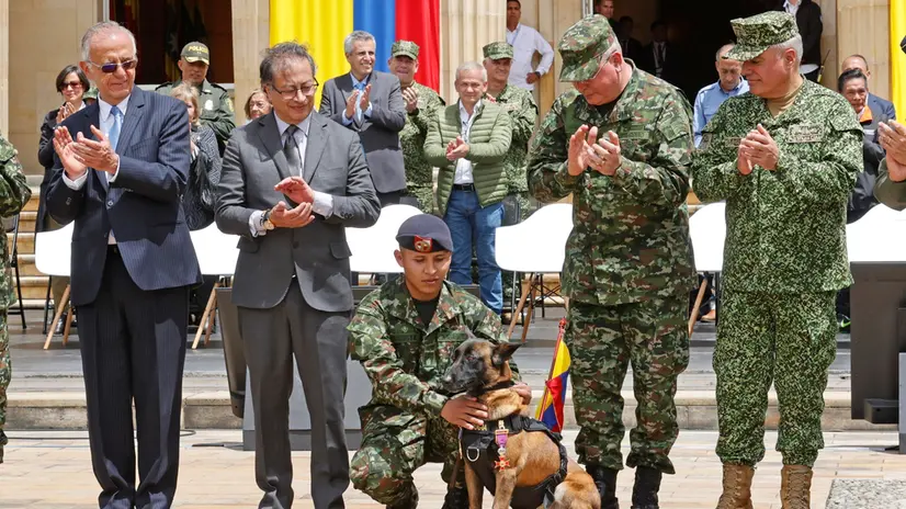 epa10712862 Colombian President Gustavo Petro (2-L) awards a decorations to the mother of Wilson, the dog that helped rescue the indigenous children who were lost in the jungle for 40 days and who got lost in the jungle during the operation, at the Nariño Palace, in Bogota, Colombia, on 26 June 2023. EPA/Mauricio Duenas Castaneda