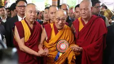 epa12219503 Tibetan Buddhism spiritual leader the Dalai Lama (C) arrives to attend his 90th birthday celebrations at Tibetans' main temple of Tsuglagkhang at McLeod Ganj, near Dharamsala, India, 06 July 2025. EPA/HARISH TYAGI