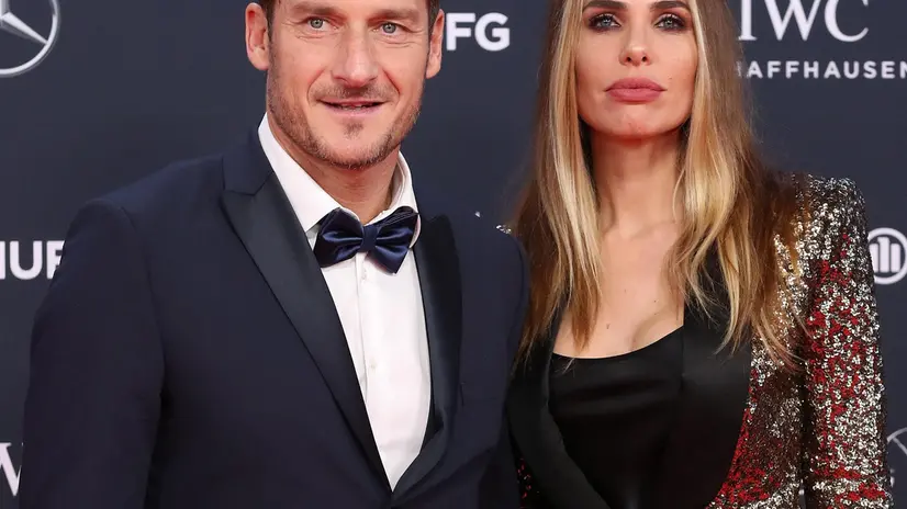 epa06569288 Former Italian soccer player Francesco Totti (L) and his wife Ilary Blasi (R) arrive at the 2018 Laureus World Sports Awards in Monaco, 27 February 2018. The annual Laureus Awards are held to honor people whom make a notable impact and remarkable accomplishments in the world of sport throughout the year. EPA/SEBASTIEN NOGIER