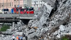A ministerial commission inspect the rubble of the Morandi highway bridge, which partially collapsed on 14 August, claiming 43 lives, in Genoa, Italy, 27 August 2018. ANSA/SIMONE ARVEDA