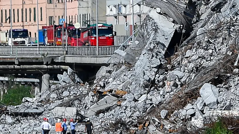 A ministerial commission inspect the rubble of the Morandi highway bridge, which partially collapsed on 14 August, claiming 43 lives, in Genoa, Italy, 27 August 2018. ANSA/SIMONE ARVEDA