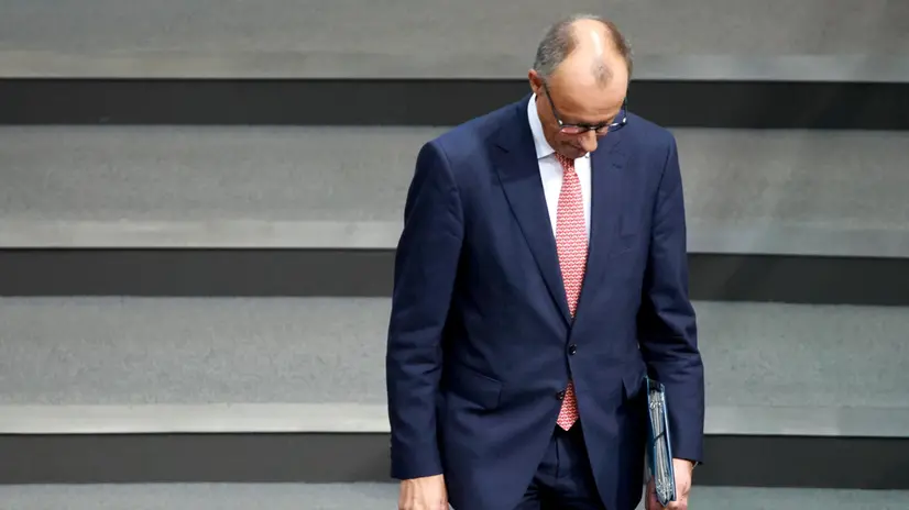 epa12225966 German Chancellor Friedrich Merz arrives for a session of the German parliament 'Bundestag' as part of the draft budget for 2025 consultations in Berlin, Germany, 09 July 2025. EPA/CLEMENS BILAN