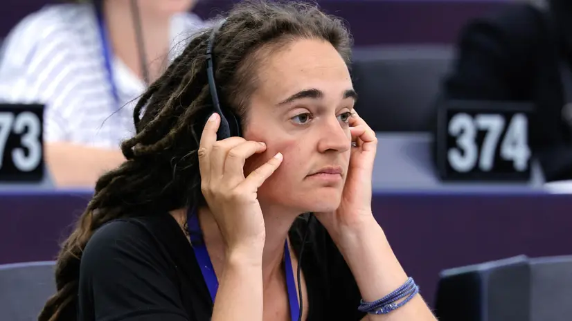 epa11483367 German conservation ecologist, captain, activist and MEP Carola Rackete attends a voting session as part of the plenary session at the European Parliament in Strasbourg, France, 17 July 2024. The first session of the new European Parliament opened on 16 July, with MEPs due to elect their president and vice-presidents for the next two and a half years. Roberta Metsola was re-elected as President of the European Parliament until 2027, with 562 votes in the first round. The EU Parliament's session runs from 16 until 19 July 2024. EPA/RONALD WITTEK