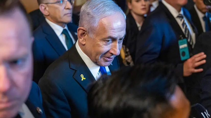 epa12227803 Israeli Prime Minister Benjamin Netanyahu (C) responds to a question from the news media as he walks to a meeting with bipartisan Senate leadership in the US Capitol in Washington, DC, USA, 09 July 2025. EPA/SHAWN THEW