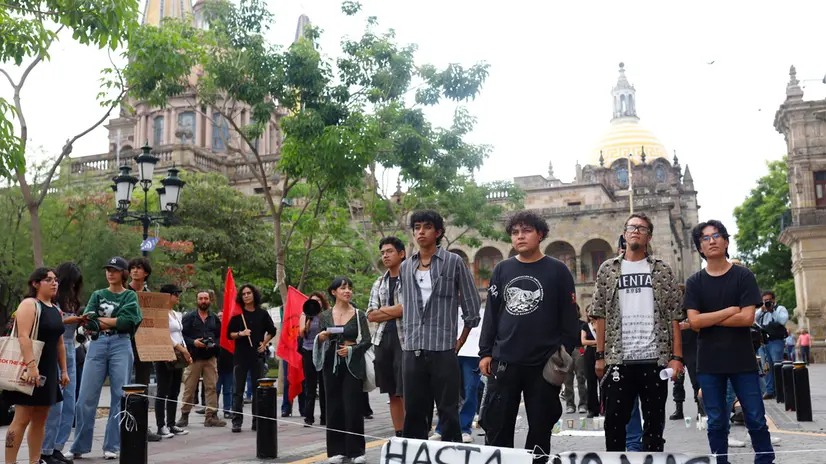 epa12225809 Students participate in a demonstration in front of the Jalisco Government Palace in Guadalajara, Mexico, 08 July 2025. Students demonstrated to demand that the Jalisco state government (western Mexico) speed up investigations to reveal the identity of the bodies found in a grave in the municipality of Zapopan, where they fear some of their classmates remains could be located. EPA/FRANCISCO GUASCO
