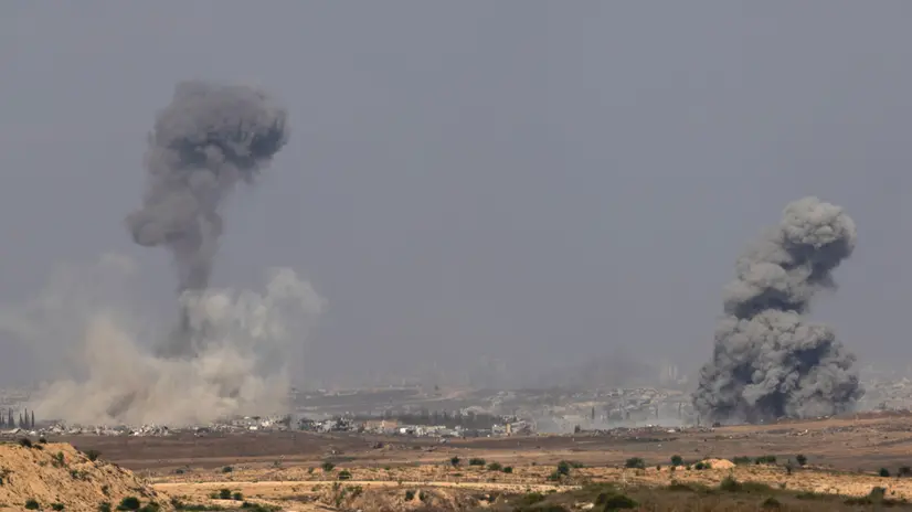 epa12228484 Smoke rises following an Israeli airstrike in the northern Gaza Strip near Beit Hanoun, as seen from the Israeli side of the border, 10 July 2025. EPA/ATEF SAFADI
