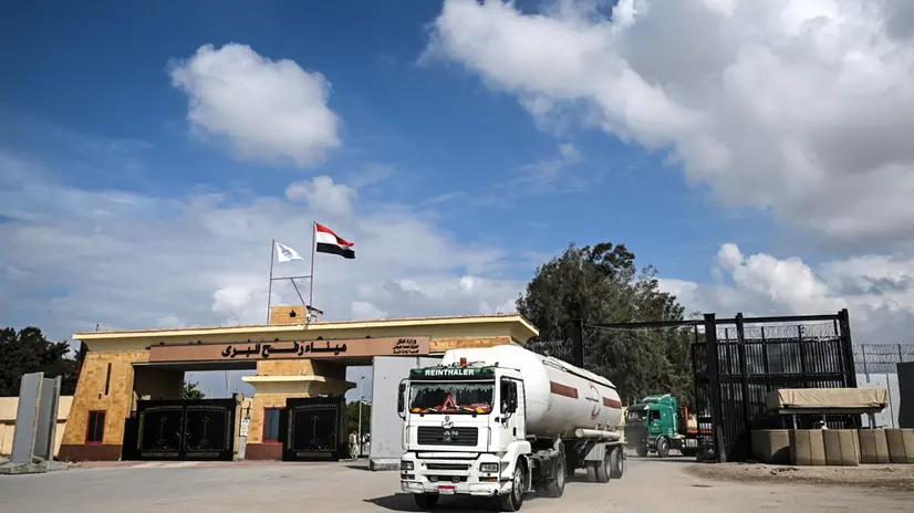 epa11887884 A truck carrying fuel crosses the Rafah border point between Egypt and the Gaza Strip, in Rafah, Egypt, 11 February 2025. A first phase of a six-week ceasefire deal between Israel and Hamas came into effect on 19 January 2025. EPA/MOHAMED HOSSAM