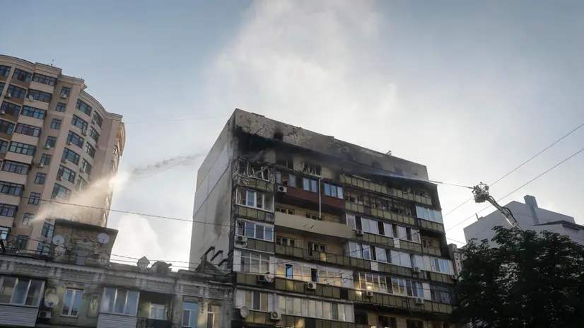 epa12228429 Rescuers work at a residential building after it was hit by a Russian drone in Kyiv, Ukraine, 10 July 2025, amid the ongoing Russian invasion. At least two people were killed in Kyiv, and many others were injured across Ukraine, following overnight Russian strikes in the Kyiv, Chernihiv, Sumy, Poltava, Kirovohrad and Kharkiv regions, the State Emergency Service confirmed. EPA/SERGEY DOLZHENKO