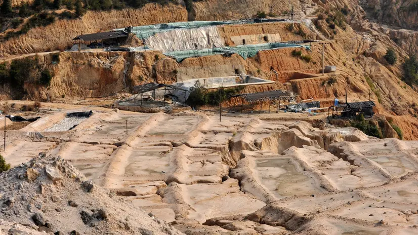 epa03097655 (FILE) A file picture made available on 09 February 2012 shows a rare earth mine in Ganxian county in central China's Jiangxi province on 30 December 2010. China exported 14,750 tons of rare earth in the first 11 months of 2011, meeting only about half of the total quota for exports for 2011. EPA/STR CHINA OUT