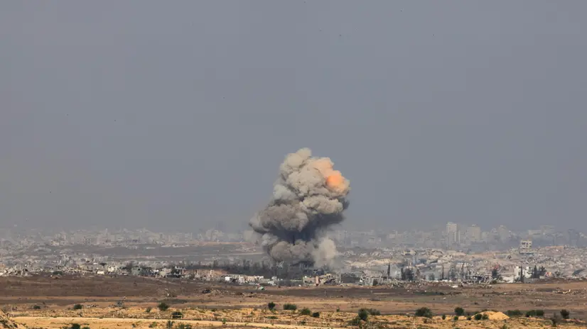 epa12228474 Smoke rises following an Israeli airstrike in the northern Gaza Strip near Beit Hanoun, as seen from the Israeli side of the border, 10 July 2025. EPA/ATEF SAFADI