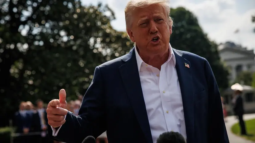 epa12232055 US President Donald Trump responds to questions from reporters after walking out of the South Portico of the White House to board Marine One on the South Lawn, in Washington, DC, USA, 11 July 2025. President Trump and First Lady are heading to Kerrville, Texas, to meet with local officials and first responders after a deadly flash flood a week ago killed at least 120 people with at least 160 people still missing. EPA/SAMUEL CORUM / POOL
