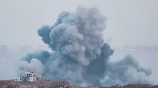epaselect epa12234940 Smoke rises following an Israeli airstrike in the northern Gaza Strip near Beit Hanoun, as seen from the Israeli side of the border with the Gaza Strip in southern Israel, 13 July 2025. EPA/ABIR SULTAN